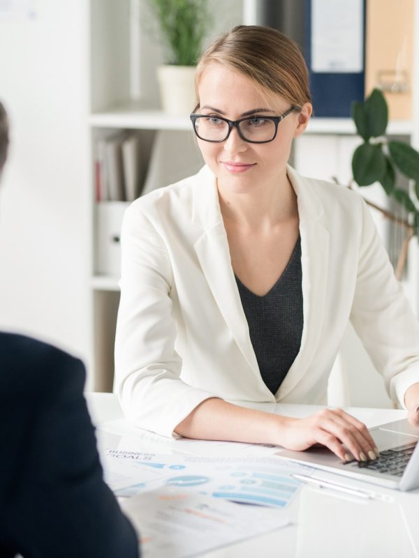content-attractive-female-business-consultant-working-with-clien-r7jtkhc6vllaukdrrt3o060xa2h8xa74mfjrz0q1c0